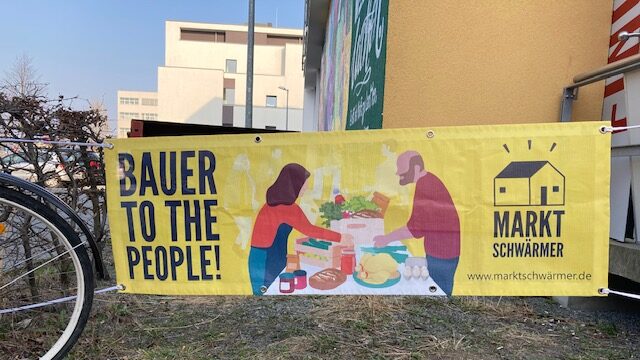 Foto von einem Poster auf dem steht "Bauer to the People"